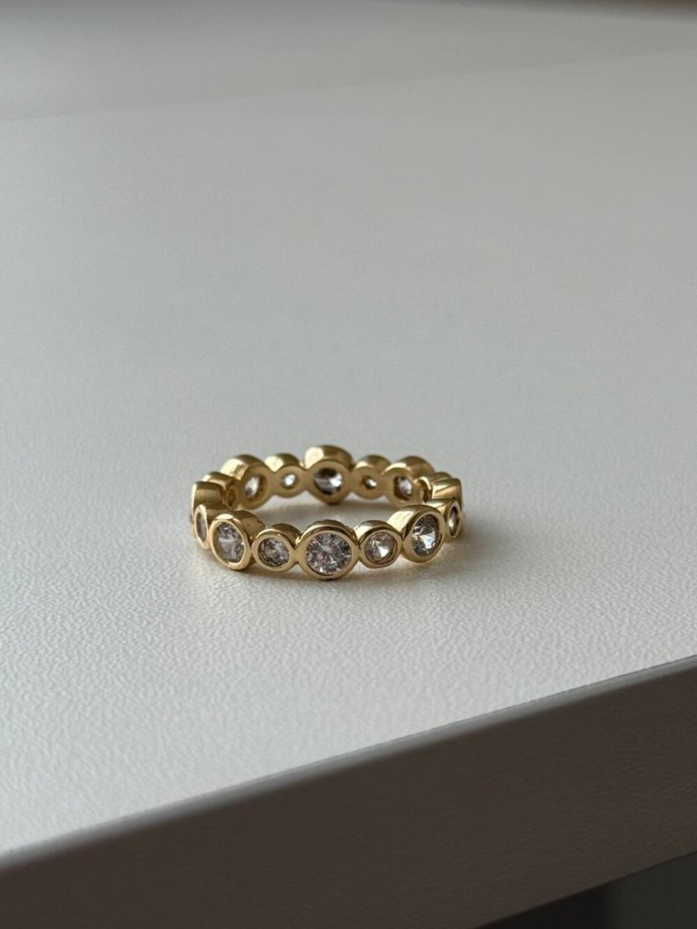 Golden round cubic zirconia ring
